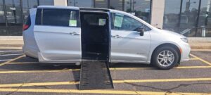 Silver Chrysler Pacifica with Driverge Side Entry Automatic Fold Out conversion