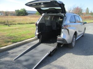 Silver Toyota Sienna with Driverge Rear Entry Manual Fold Out conversion