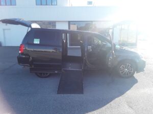 Black Dodge Grand Caravan with Other Side Entry Automatic Fold Out conversion