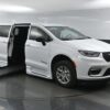 White Chrysler Pacifica with BraunAbility Side Entry Automatic Fold Out conversion