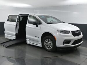 White Chrysler Pacifica with BraunAbility Side Entry Automatic Fold Out conversion
