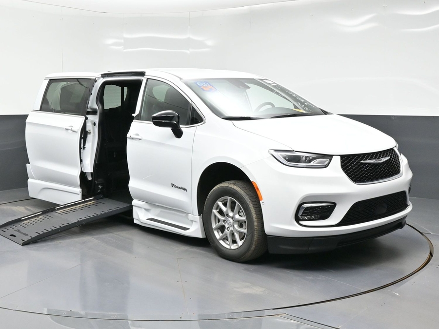 White Chrysler Pacifica with BraunAbility Side Entry Automatic Fold Out conversion