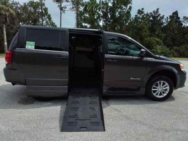 Grey Dodge Grand Caravan with BraunAbility Side Entry Automatic Fold Out conversion