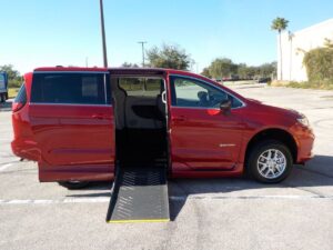 Red Chrysler Pacifica with Driverge Side Entry Automatic Fold Out conversion