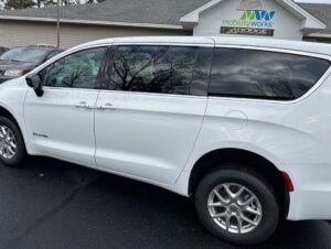 White Chrysler Pacifica with BraunAbility Rear Entry Manual Fold Out conversion