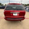 Red Chrysler Town and Country with BraunAbility Side Entry Manual Fold Out conversion