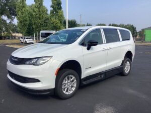 White Chrysler Voyager with BraunAbility Side Entry Manual Fold Out conversion