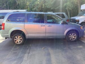 Blue Chrysler Town and Country with Freedom Motors Rear Entry Manual Fold Out conversion