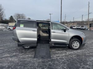 Silver Chrysler Voyager with BraunAbility Side Entry Manual Fold Out conversion