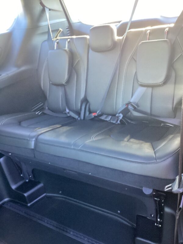 Red Chrysler Pacifica with BraunAbility Side Entry Automatic In Floor conversion