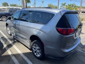 Silver Chrysler Pacifica with BraunAbility Side Entry Automatic In Floor conversion