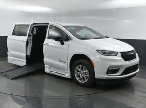 White Chrysler Pacifica with BraunAbility Side Entry Automatic In Floor conversion