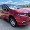 Red Chrysler Pacifica with BraunAbility Side Entry Automatic Fold Out conversion