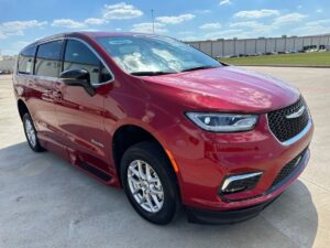 Red Chrysler Pacifica with BraunAbility Side Entry Automatic Fold Out conversion