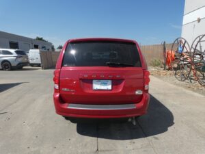Red Dodge Grand Caravan with Vantage Mobility Side Entry Manual In Floor conversion