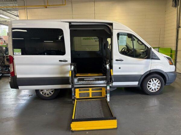 White Ford Transit with Other Side Entry Automatic Fold Out conversion