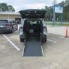 Silver Toyota Sienna with Driverge Rear Entry Manual Fold Out conversion
