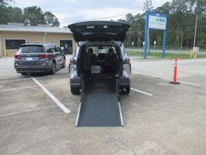 Silver Toyota Sienna with Driverge Rear Entry Manual Fold Out conversion