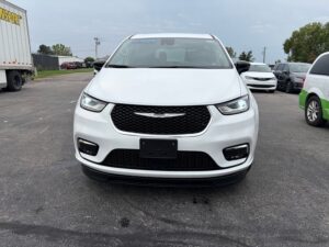 White Chrysler Pacifica with BraunAbility Side Entry Automatic Fold Out conversion