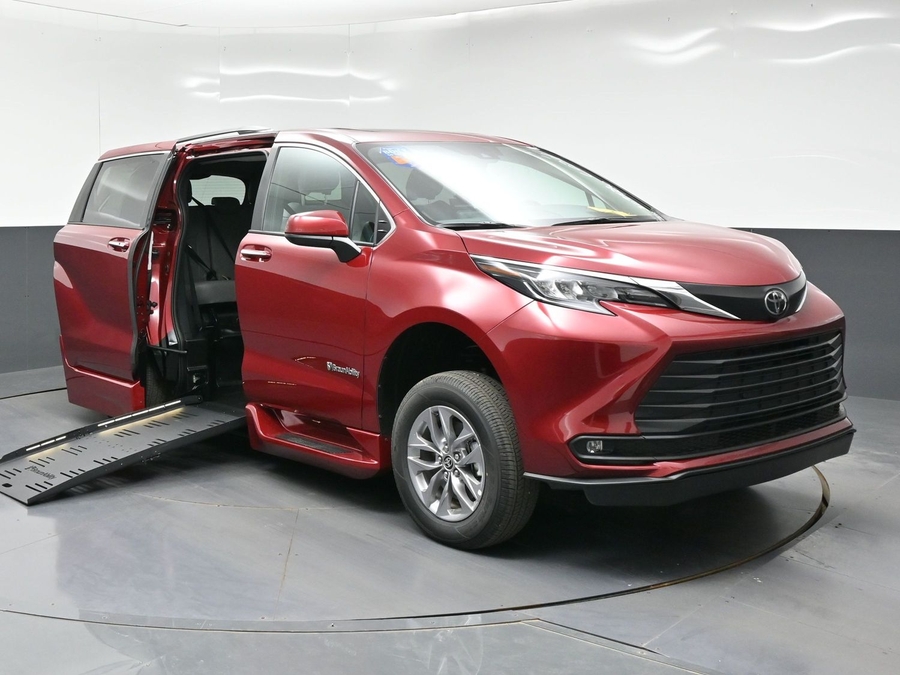 Red Toyota Sienna with BraunAbility Side Entry Automatic Fold Out conversion