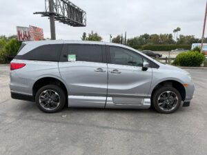 Silver Honda Odyssey with Vantage Mobility Side Entry Automatic In Floor conversion