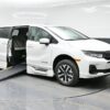 White Honda Odyssey with BraunAbility Side Entry Automatic In Floor conversion