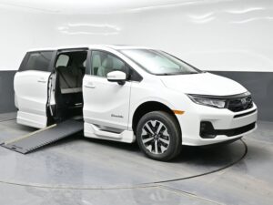 White Honda Odyssey with BraunAbility Side Entry Automatic In Floor conversion