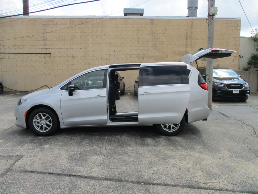 Silver Chrysler Voyager with Driverge Side Entry Automatic Fold Out conversion