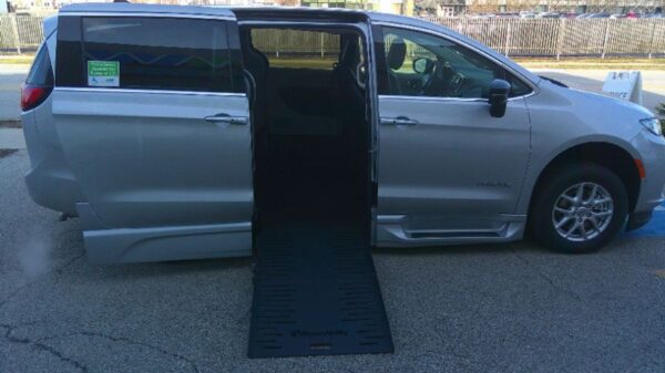 Red Chrysler Pacifica with BraunAbility Side Entry Automatic Fold Out conversion