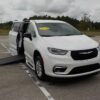 White Chrysler Pacifica with BraunAbility Side Entry Automatic In Floor conversion