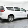 White Chrysler Voyager with BraunAbility Rear Entry Manual Fold Out conversion