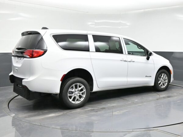 White Chrysler Voyager with BraunAbility Rear Entry Manual Fold Out conversion