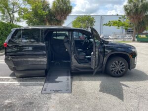 Black Chevrolet Traverse with BraunAbility Side Entry Automatic In Floor conversion
