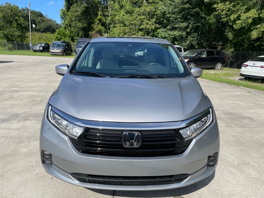 Silver Honda Odyssey with BraunAbility Side Entry Automatic In Floor conversion