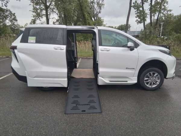 White Toyota Sienna with BraunAbility Side Entry Automatic Fold Out conversion