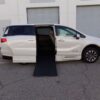White Honda Odyssey with BraunAbility Side Entry Automatic In Floor conversion