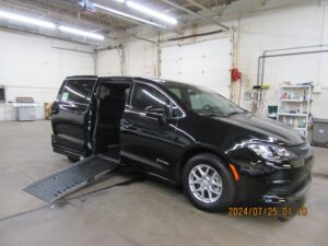 Black Chrysler Voyager with Driverge Side Entry Automatic Fold Out conversion