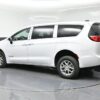 White Chrysler Voyager with BraunAbility Rear Entry Manual Fold Out conversion