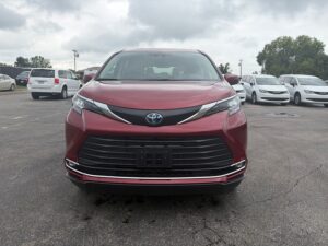 Red Toyota Sienna with BraunAbility Side Entry Automatic Fold Out conversion