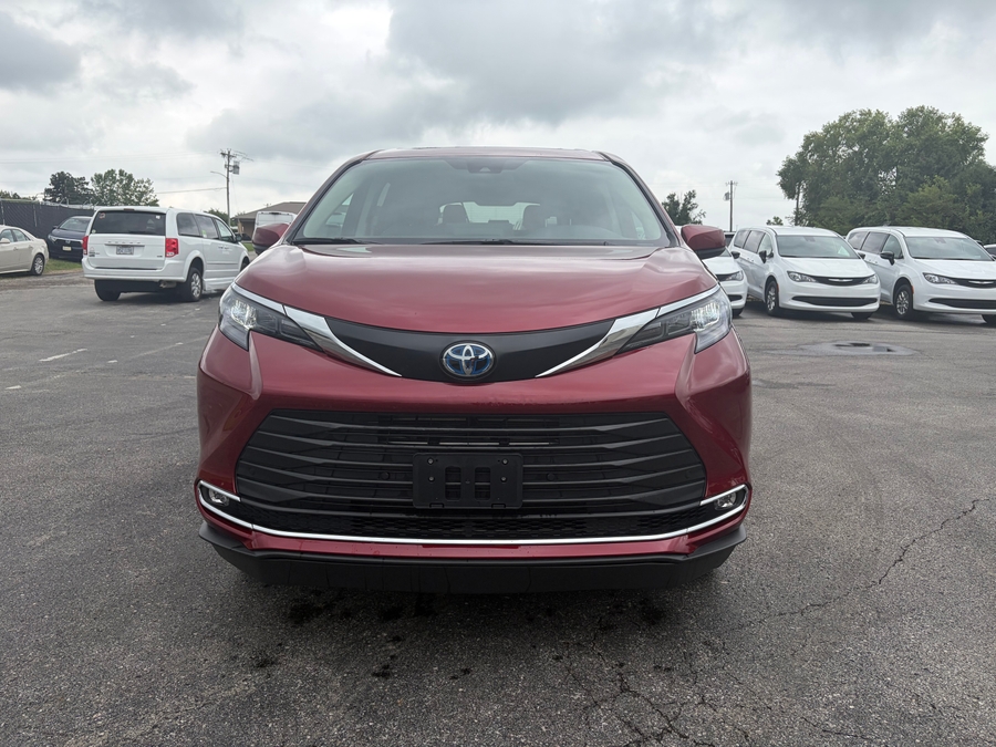 Red Toyota Sienna with BraunAbility Side Entry Automatic Fold Out conversion