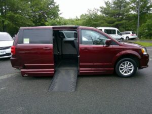 Red Dodge Grand Caravan with Vantage Mobility Side Entry Automatic Fold Out conversion