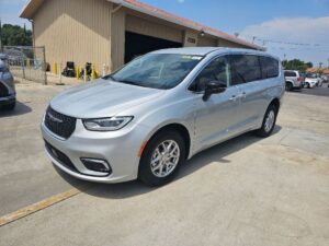 Silver Chrysler Pacifica with Driverge Rear Entry Manual Fold Out conversion