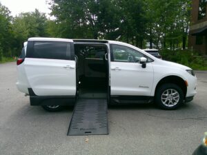 White Chrysler Voyager with BraunAbility Side Entry Manual Fold Out conversion