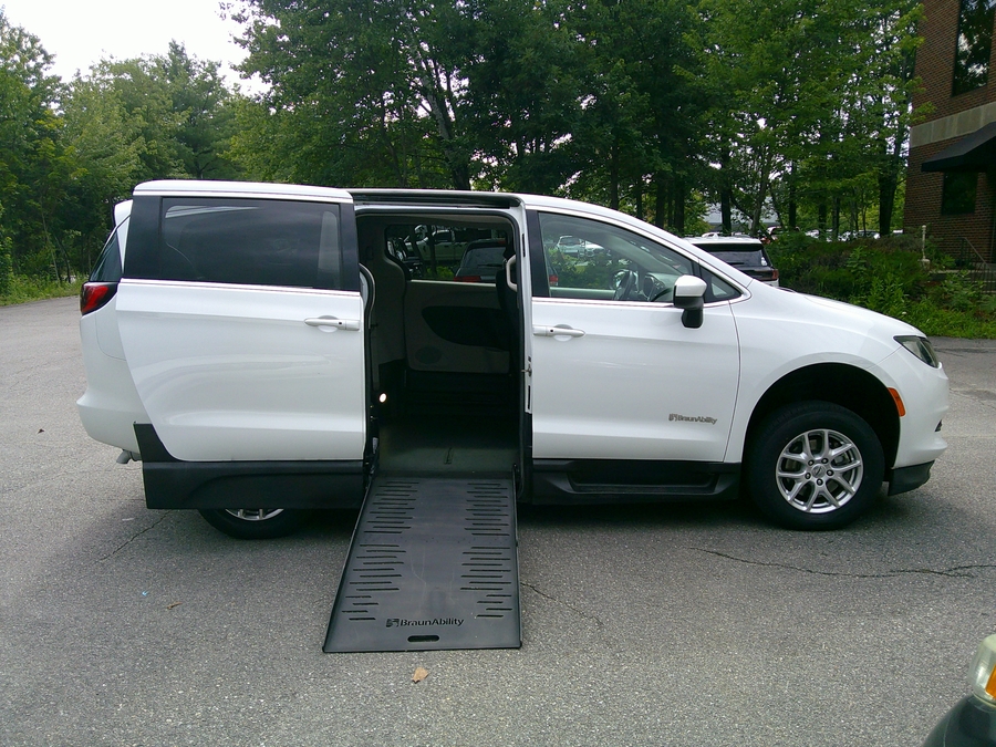 White Chrysler Voyager with BraunAbility Side Entry Manual Fold Out conversion