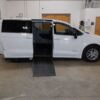 White Chrysler Voyager with Driverge Side Entry Automatic Fold Out conversion