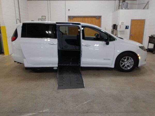 White Chrysler Voyager with Driverge Side Entry Automatic Fold Out conversion