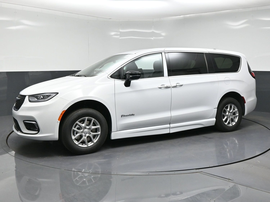 White Chrysler Pacifica with BraunAbility Side Entry Automatic Fold Out conversion