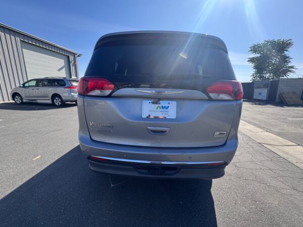 Silver Chrysler Pacifica with BraunAbility Side Entry Automatic Fold Out conversion