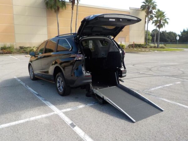 Black Toyota Sienna with Driverge Rear Entry Manual Fold Out conversion
