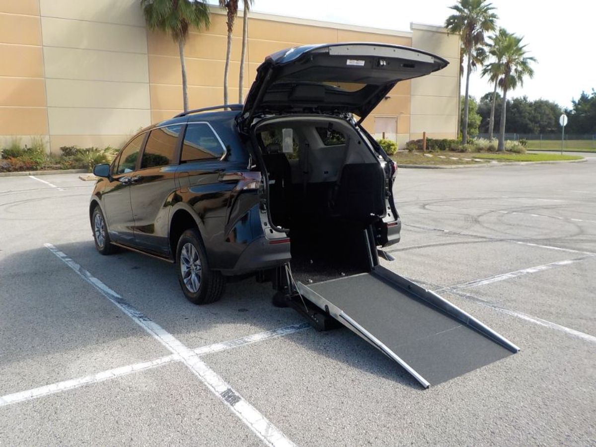 Black Toyota Sienna with Driverge Rear Entry Manual Fold Out conversion